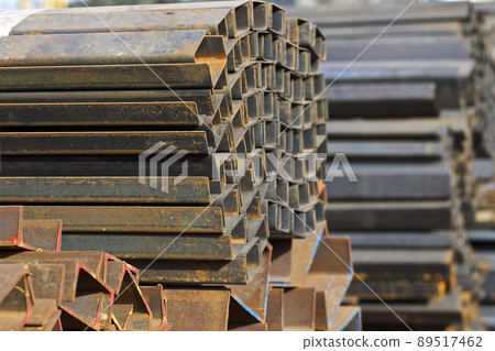 Metal profiles of different kinds are located in the metal products warehouse 89517462