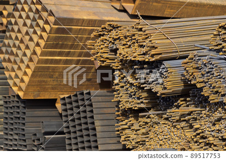 Metal profiles of different kinds are located in the metal products warehouse Metal profiles of different kinds are located in the metal products warehouse 89517753