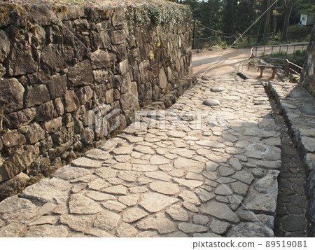 Stone wall and stone pavement Stone wall and stone pavement 89519081