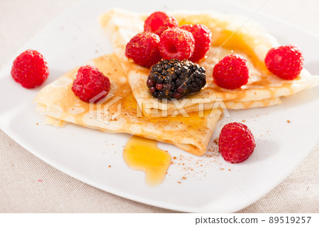 pancakes with raspberries, blackberries and honey pancakes with raspberries, blackberries and honey 89519257