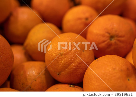 tangerines on the counter in the store tangerines on the counter in the store 89519651