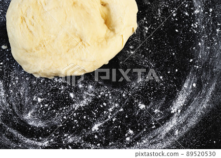 Dough on floured surface 89520530