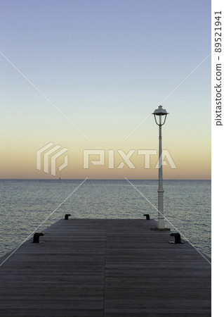 Beautiful colors of a sunset on the sea Beautiful colors of a sunset on the sea 89521941