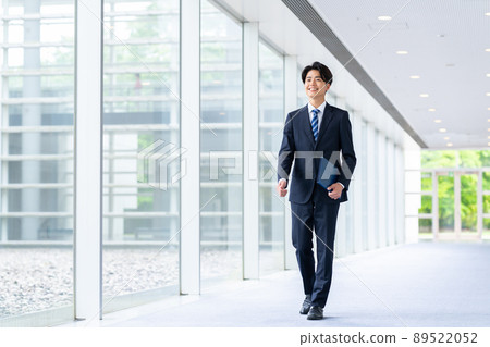 Young businessman in the office Young businessman in the office 89522052