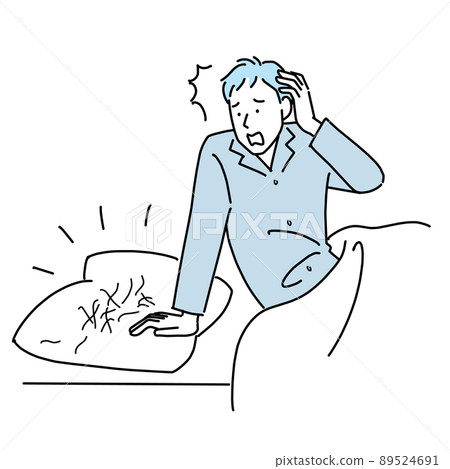 A man surprised to see a lot of hair loss on his pillow 89524691