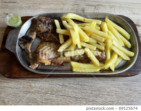 Steak and potato fries Steak and potato fries 89525674