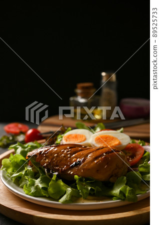 Grilled teriyaki chicken breast steak with fresh organic salad mixes Grilled teriyaki chicken breast steak with fresh organic salad mixes 89525733