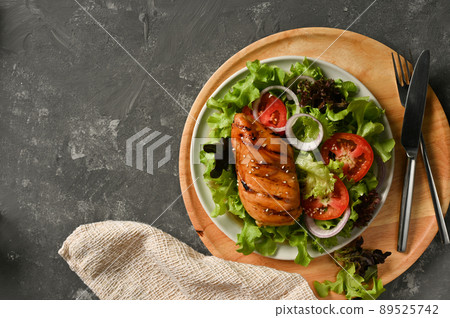 Chicken fillet or chicken breast with organic fresh vegetables salad 89525742