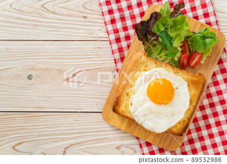 bread toasted with cheese and fried egg bread toasted with cheese and fried egg 89532986
