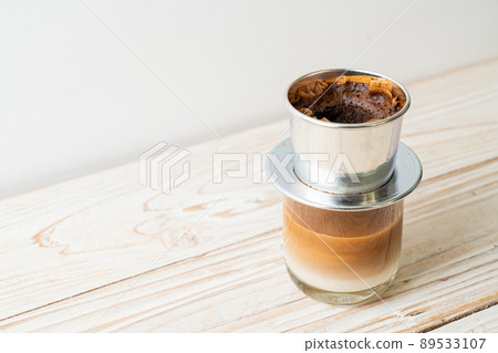 Hot milk coffee dripping in Vietnam style 89533107