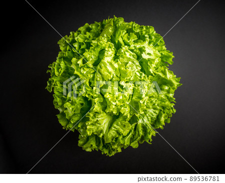 Lettuce salad isolated on a black background 89536781