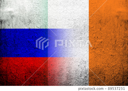 National flag of Russian Federation with The Republic of Ireland National flag. Grunge background National flag of Russian Federation with The Republic of Ireland National flag. Grunge background 89537231