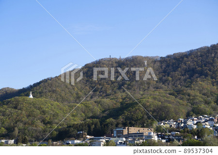 Mt. Moiwa and Tower of Peace in Spring Mt. Moiwa and Tower of Peace in Spring 89537304