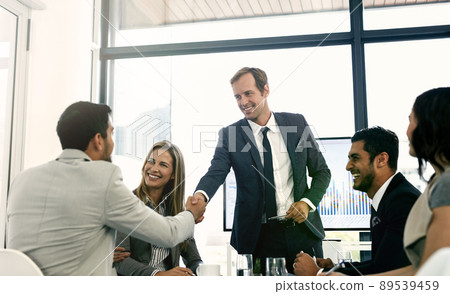 Presenting ideas to the team. Shot of corporate businesspeople meeting in the boardroom. 89539459