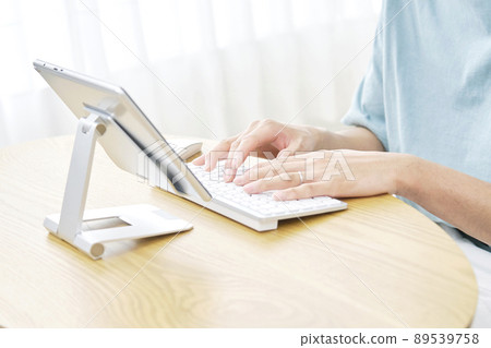 Male tablet living room without face 89539758