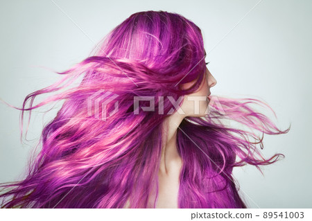 Portrait of young beautiful woman with long flying hair Portrait of young beautiful woman with long flying hair 89541003
