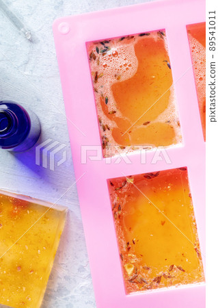 Soap making at home. Liquid glycerin with natural additives and essential oils Soap making at home. Liquid glycerin with natural additives and essential oils 89541011