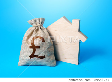 House silhouette and a british pound sterling money bag. Mortgage loan. House project development. Rental business. Property appraisal. Home purchase, investment in real estate construction. 89541247