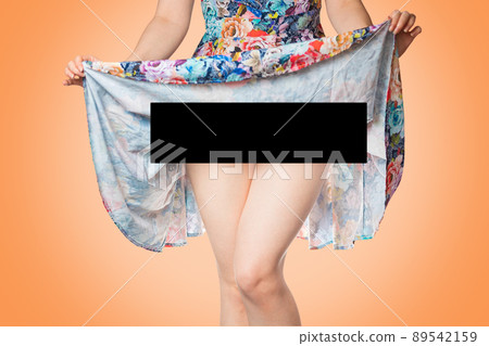 Woman up her skirt and shows her underwear. The black stripe covers the intimate parts of the body. Close-up. Copy space. Mock up. The concept of sex industry and censored 89542159