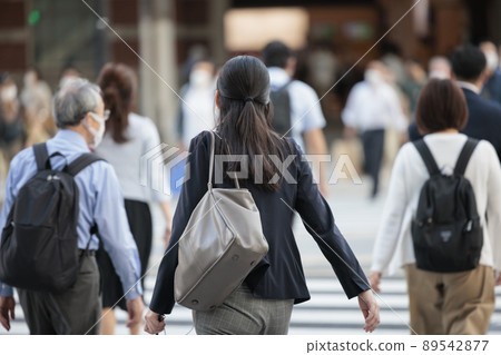 Back view of commuting woman Back view of commuting woman 89542877