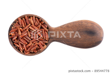 Red rice isolated in wooden spoon, on white background. Whole grain raw brown rice. Top view. Red rice isolated in wooden spoon, on white background. Whole grain raw brown rice. Top view. 89544778