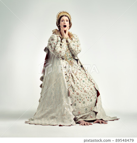 The peasants are revolting. Studio shot of young queen gasping in surprise. The peasants are revolting. Studio shot of young queen gasping in surprise. 89548479