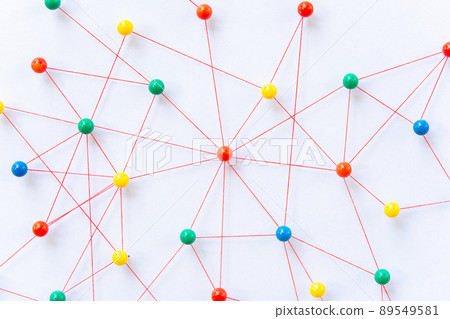 Linking entities, Blockchain, social media, Communications Network, The connection between the two networks. Network simulation on paper linked together by yarn Linking entities, Blockchain, social media, Communications Network, The connection between the two networks. Network simulation on paper linked together by yarn 89549581