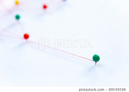 Linking entities, Blockchain, social media, Communications Network, The connection between the two networks. Network simulation on paper linked together by yarn Linking entities, Blockchain, social media, Communications Network, The connection between the two networks. Network simulation on paper linked together by yarn 89549586