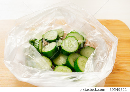 Cut cucumber in a plastic bag 89549821