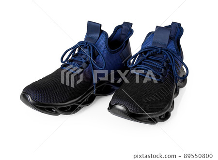 Pair of new grooved sneakers isolated on a white background. Pair of new grooved sneakers isolated on a white background. 89550800
