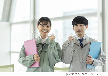 Young male and female construction engineers Young male and female construction engineers 89551169