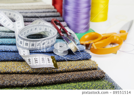 Colorful sewing thread, background, tailor-related images. On a white background. 89551514