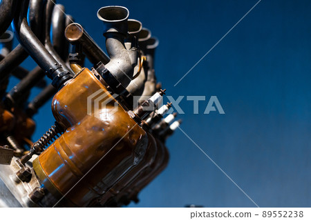 Close-up of a detail of a rare car engine. Metal mechanisms. Automotive industry 89552238