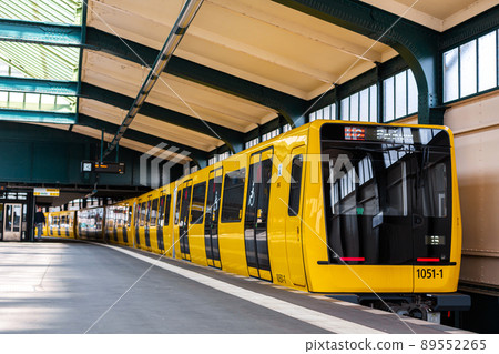 Modern subway. Yellow train at the station 89552265