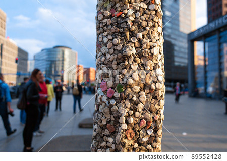 Monument parts of the Berlin wall pasted over with chewing gum 89552428