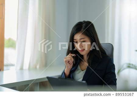 data analysis, plan, marketing, accounting, audit, Portrait of asian business woman planning marketing using computer and statistical data sheet to present marketing plan project at meeting 89553167