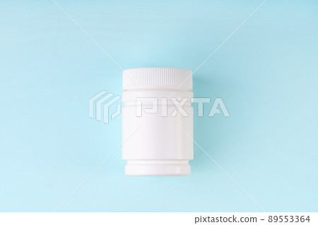 Bottle mockup on blue background. Blank package, bottle, container from pills, capsules. Bottle mockup on blue background. Blank package, bottle, container from pills, capsules. 89553364