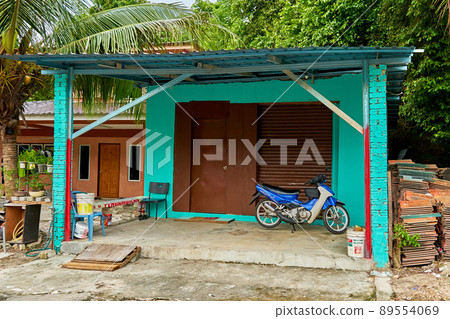 House by the road in a village on an island in Malaysia 89554069