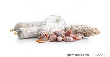 Traditional sausage with white mold. Dried pork salami isolated on white background. 89554560