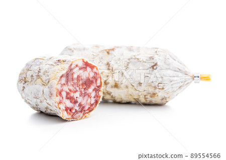 Traditional sausage with white mold. Dried pork salami isolated on white background. Traditional sausage with white mold. Dried pork salami isolated on white background. 89554566
