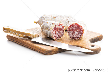 Traditional sausage with white mold. Dried pork salami isolated on white background. 89554568