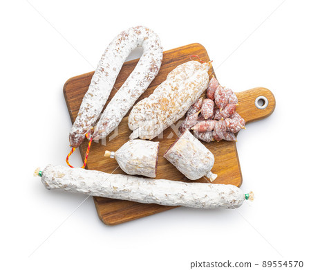 Traditional sausage with white mold. Dried pork salami isolated on white background. 89554570