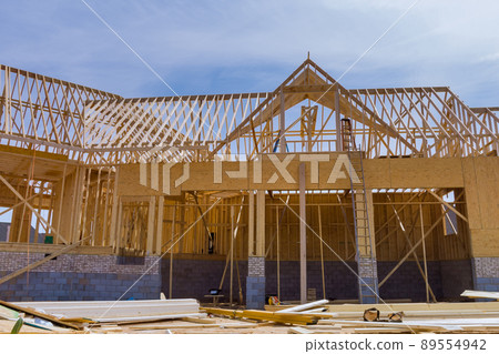 Framed residential home with construction of a timber frame house Framed residential home with construction of a timber frame house 89554942