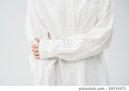 woman holding arms woman holding arms 89554975