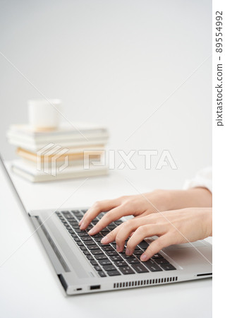 Laptop and female hands Laptop and female hands 89554992