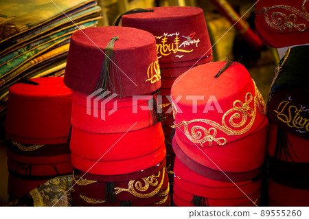 Turkish traditional red hat fez, fes or tarboosh with arabic or Ottoman style Turkish traditional red hat fez, fes or tarboosh with arabic or Ottoman style 89555260