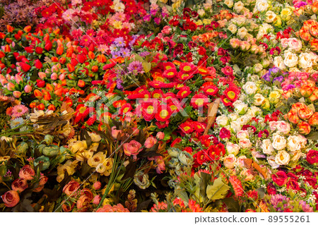 Floral art made of artificial flowers in view 89555261