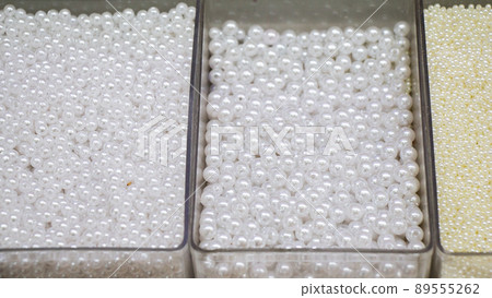 Pearl beads in different boxes as material for handmade jewelery Pearl beads in different boxes as material for handmade jewelery 89555262