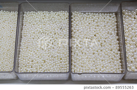 Pearl beads in different boxes as material for handmade jewelery Pearl beads in different boxes as material for handmade jewelery 89555263