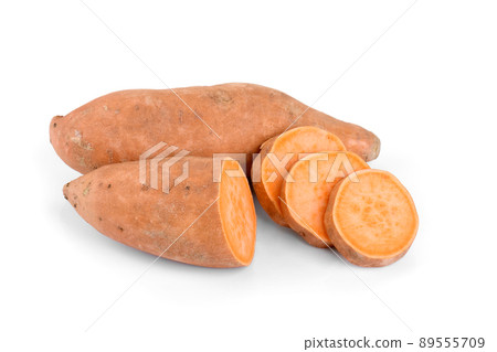 Raw whole orange sweet potato and slices of batatas isolated on white background, closeup Raw whole orange sweet potato and slices of batatas isolated on white background, closeup 89555709